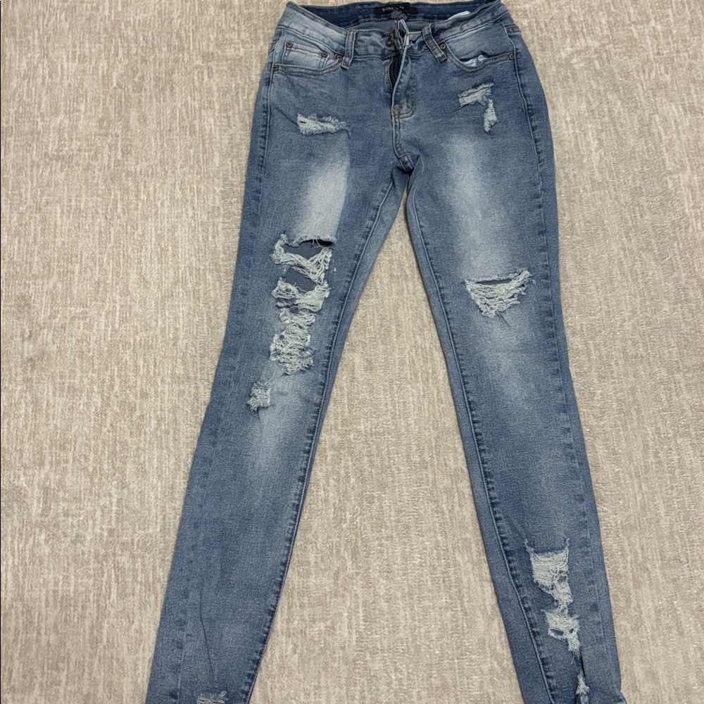Distressed Blue Jeans